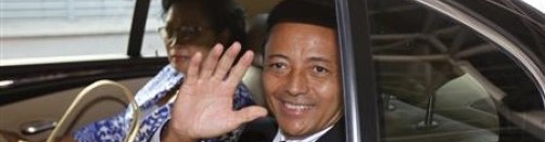 Former Madagascar leader Marc Ravalomanana and his wife Lalao wave at the O.R Tambo airport in Johannesburg Former Madagascar leader Marc Ravalomanana and his wife Lalao wave at the O.R Tambo airport in Johannesburg